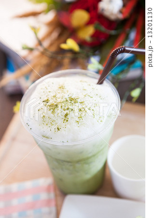 top view of green tea bubble cream in plastic glass 13201130