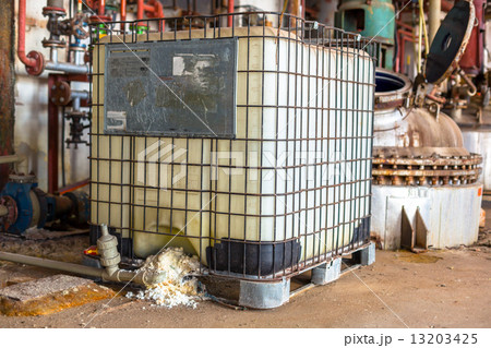 Industrial interior with chemical tanks 13203425