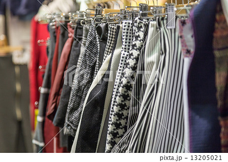 Clothing on hangers at a night market store Clothing on hangers at a night market store 13205021