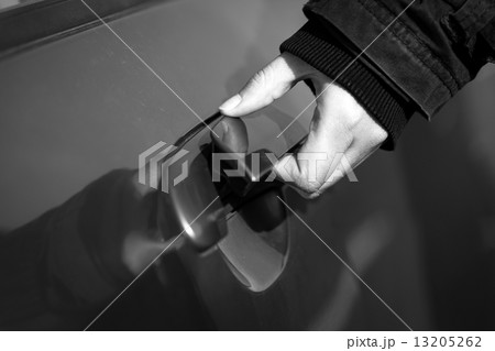 Hand of a man opening car door 13205262