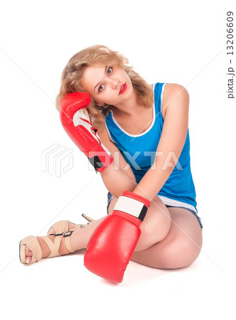 Pretty sad girl with boxing gloves 13206609