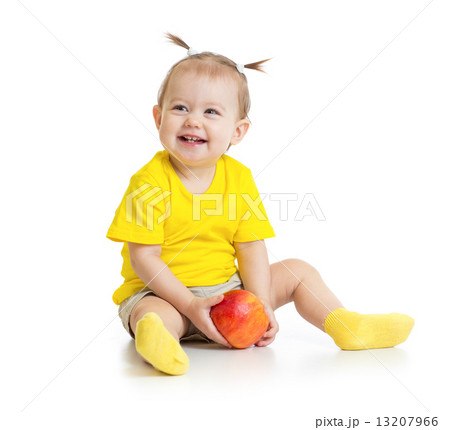 Baby eating apple sitting isolated Baby eating apple sitting isolated 13207966
