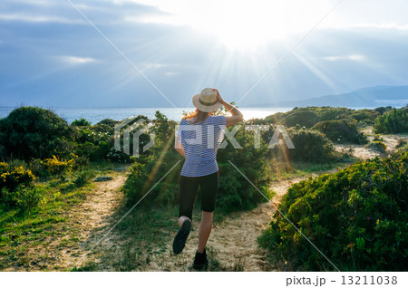 Carefree Young Woman Enjoying Spring. Freedom 13211038