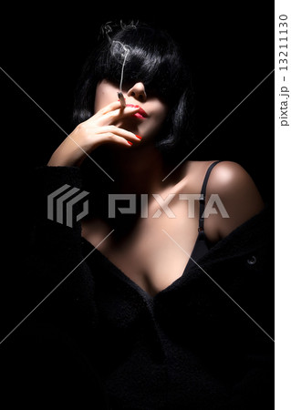 Beautiful Sexy Girl Smoking. Black Hair. Sensual red lips. 13211130
