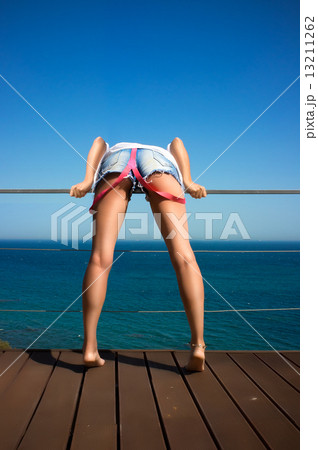 Denim Shorts. Backside of Beautiful Sexy Girl 13211262