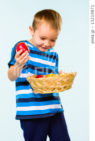 Boy and fruit basket 13219871