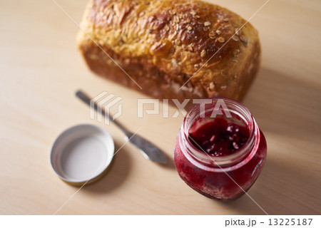 Freshly baked bread with strawberry jam Freshly baked bread with strawberry jam 13225187