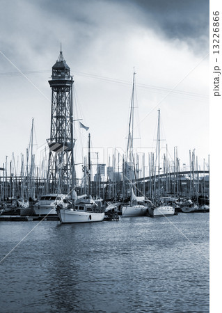 Port of Barcelona, Spain. Yachts, boats and old big tower Port of Barcelona, Spain. Yachts, boats and old big tower 13226866