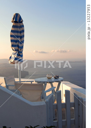 Table overlooking the sea Table overlooking the sea 13227953