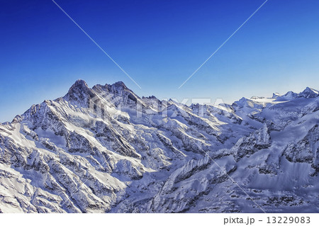 Jungfrau mountain ridge helicopter view in winter Jungfrau mountain ridge helicopter view in winter 13229083