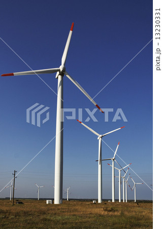 Photo of Wind power installation in sunny day 13230331