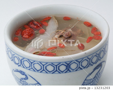 Chicken and herb soup in pot, Chinese food style. Chicken and herb soup in pot, Chinese food style. 13231203