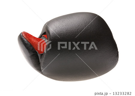 single boxing glove on a white background. 13233282