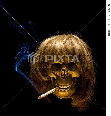 Human skull in wig smoking cigarette Human skull in wig smoking cigarette 13236816