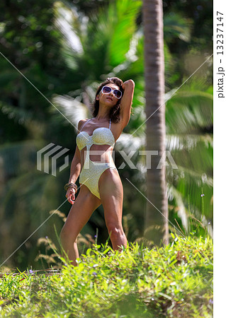 woman in tropical nature woman in tropical nature 13237147