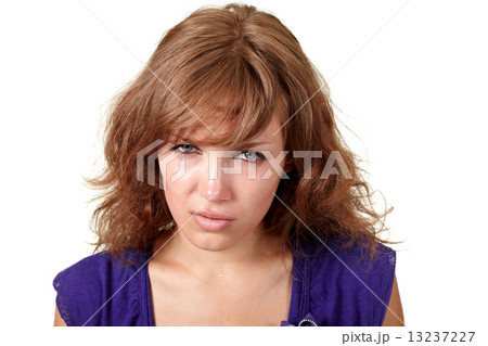 Beautiful girl crying isolated over white 13237227