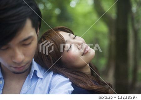 A couple, a man and woman in a Kyoto park. A couple, a man and woman in a Kyoto park. 13238597