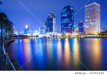 Bangkok city downtown at night with reflection of skyline, Bangk Bangkok city downtown at night with reflection of skyline, Bangk 13242345