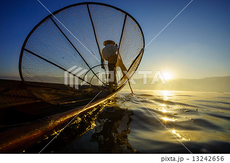 Fishermen in Inle Lake at sunrise, Shan State, Myanmar Fishermen in Inle Lake at sunrise, Shan State, Myanmar 13242656