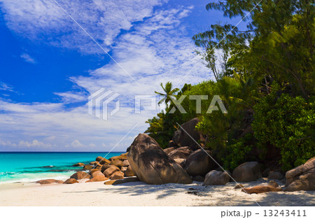 Tropical beach at island Praslin, Seychelles 13243411