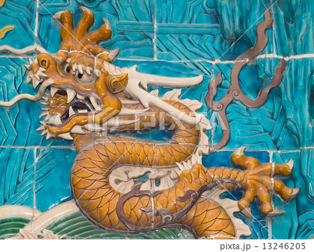Dragon sculpture. The Nine-Dragon Wall (Jiulongbi) at Beihai park, Beijing, China Dragon sculpture. The Nine-Dragon Wall (Jiulongbi) at Beihai park, Beijing, China 13246205