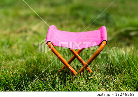 Folding camping stool in the park outdoor with day light. 13246968