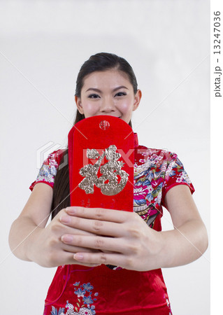 Girl holding Hongpao 13247036