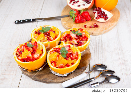 Fruit salad in hollowed-out orange Fruit salad in hollowed-out orange 13250795