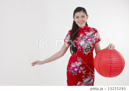 Girl holding red lantern Girl holding red lantern 13255293