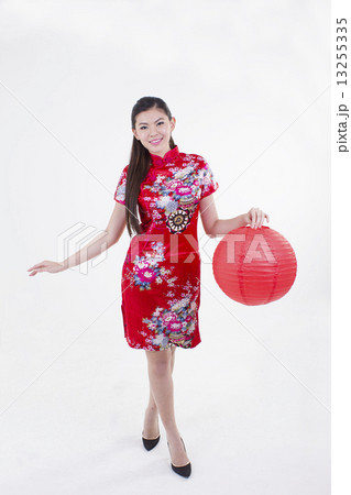Girl holding red lantern Girl holding red lantern 13255335
