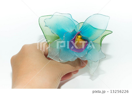 Plastic flower isolated on white background Plastic flower isolated on white background 13256226