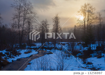 Fantastic winter landscape. Dramatic overcast sky. Fantastic winter landscape. Dramatic overcast sky. 13256997