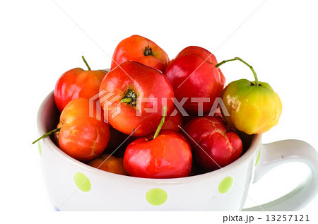 Cherries in cup isolated on white. Cherries in cup isolated on white. 13257121