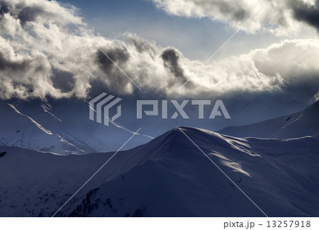 Evening mountain and sunlight clouds 13257918