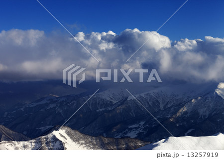 Top view on off-piste slope in sun day 13257919
