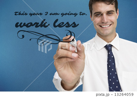 Composite image of smiling businessman holding marker 13264059