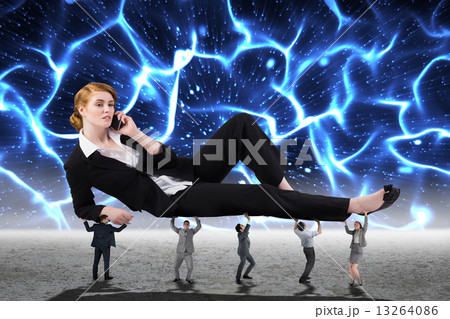 Composite image of business people supporting boss Composite image of business people supporting boss 13264086