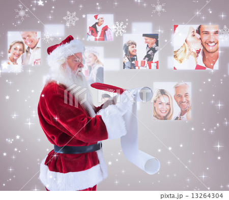 Composite image of father christmas writes a list Composite image of father christmas writes a list 13264304
