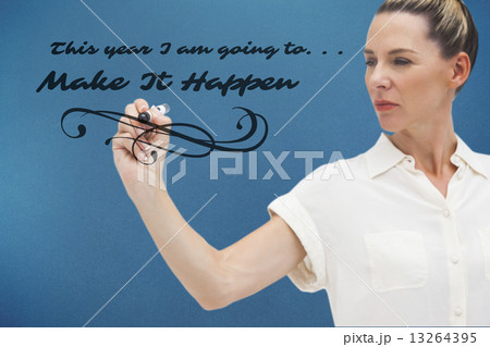 Composite image of serious businesswoman looking at pen in her h 13264395