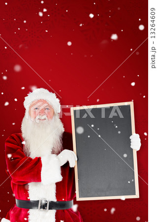 Composite image of santa claus showing blackboard Composite image of santa claus showing blackboard 13264609