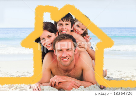 Composite image of family on the beach 13264726