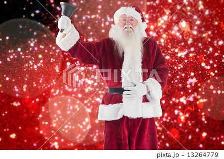 Composite image of santa claus rings his bell 13264779