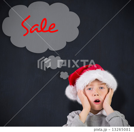Composite image of festive surprised boy Composite image of festive surprised boy 13265081