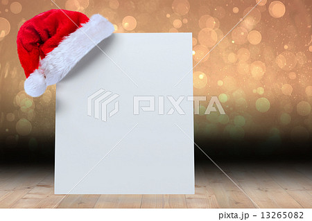 Composite image of santa hat on poster Composite image of santa hat on poster 13265082