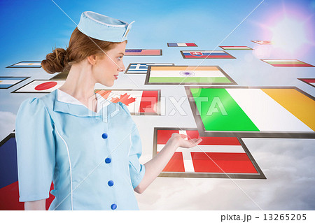 Composite image of pretty air hostess presenting with hand 13265205