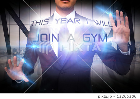 Composite image of unsmiling businessman touching Composite image of unsmiling businessman touching 13265306