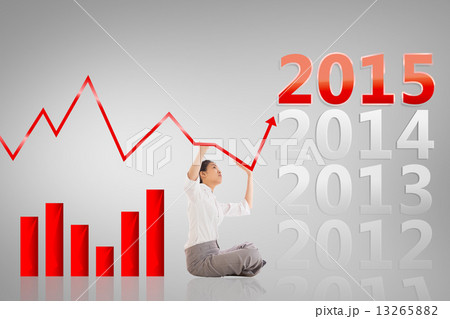 Composite image of businesswoman sitting cross legged pushing up Composite image of businesswoman sitting cross legged pushing up 13265882