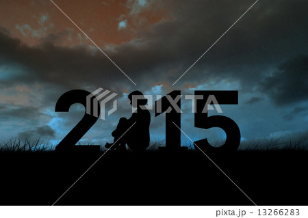 Composite image of silhouette of woman sitting 13266283