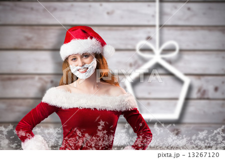 Composite image of festive redhead in foam beard 13267120