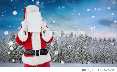 Composite image of santa claus presenting card Composite image of santa claus presenting card 13267472